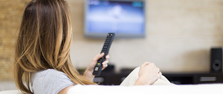 young woman watching tv
